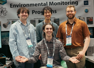 Four of the students who attended AGU. Photo credit Boris Dessimond